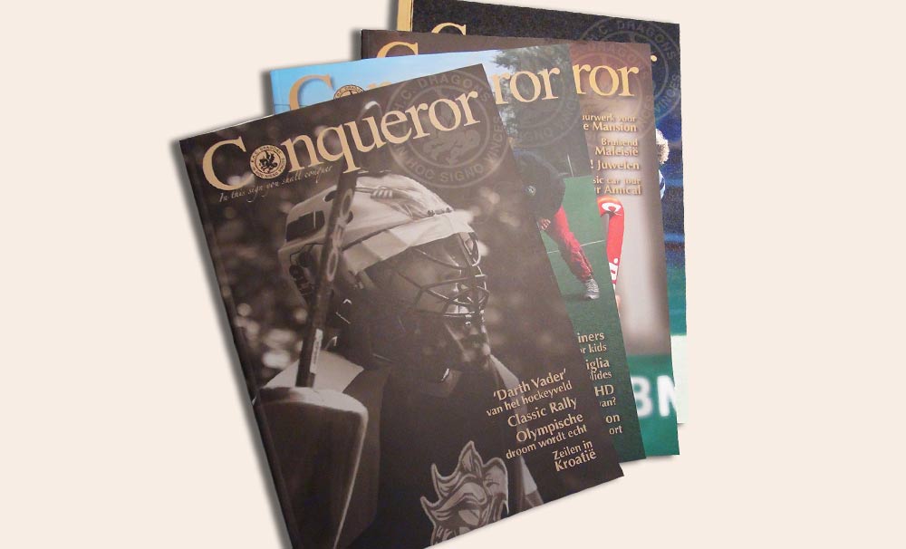 Conqueror magazine door marathon advertising agency